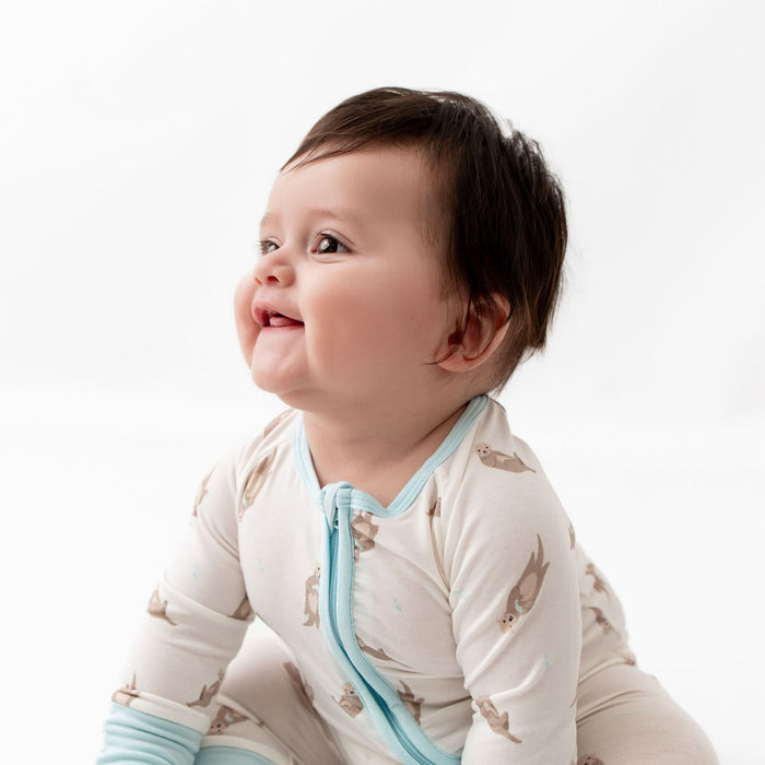 Bamboo otter convertible romper shown footless and footed