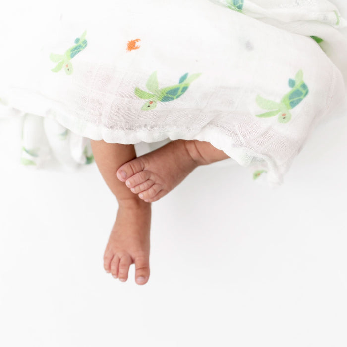 Close-up of turtle print on bamboo muslin swaddle