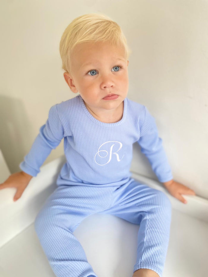 Baby Blue Ribbed Childrens Tracksuit worn by a  little boy