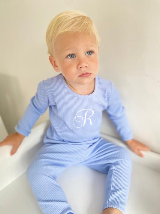 Baby Blue Ribbed Childrens Tracksuit worn by a  little boy