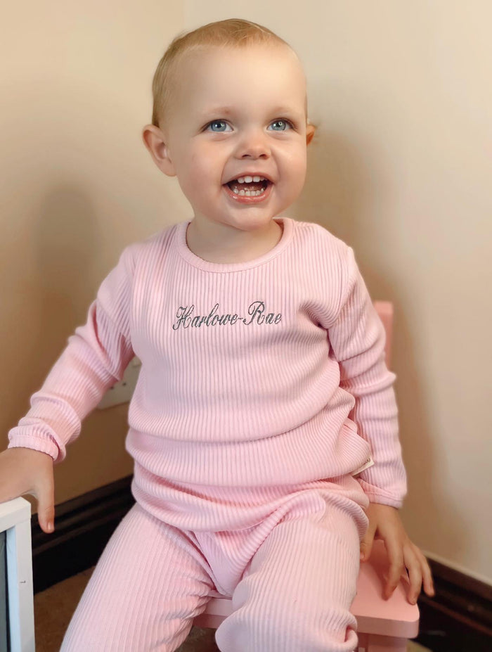 little girl wearing Baby Pink Ribbed Childrens Tracksuit