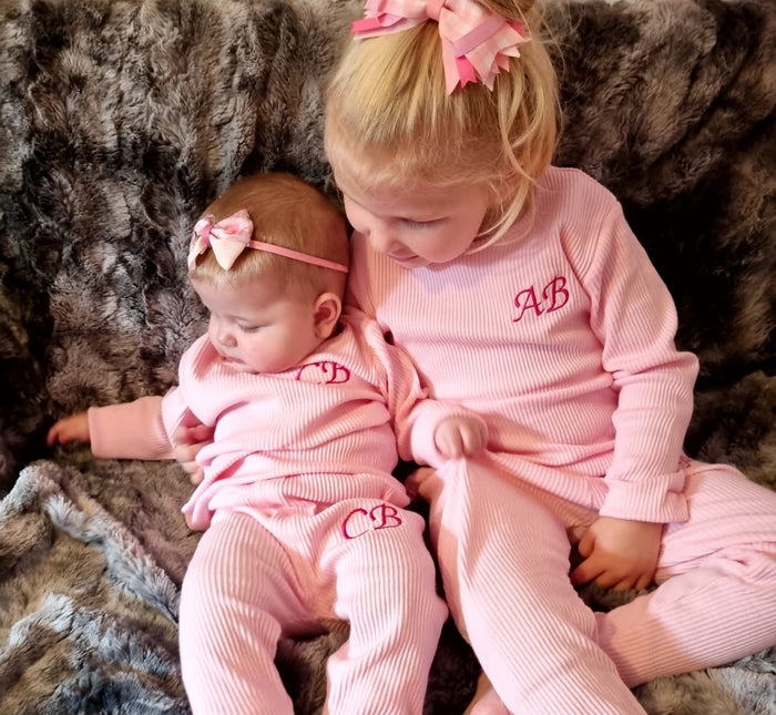 sisters wearing Baby Pink Ribbed Childrens Tracksuit