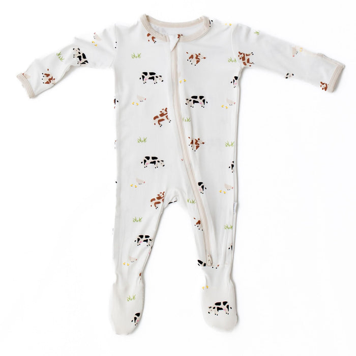 Soft bamboo baby footie with cow pattern, front view