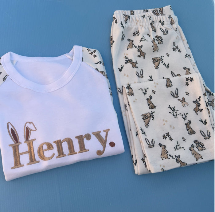 Rabbit printed pyjamas with child’s name Henry embroidered with bunny ears on the H