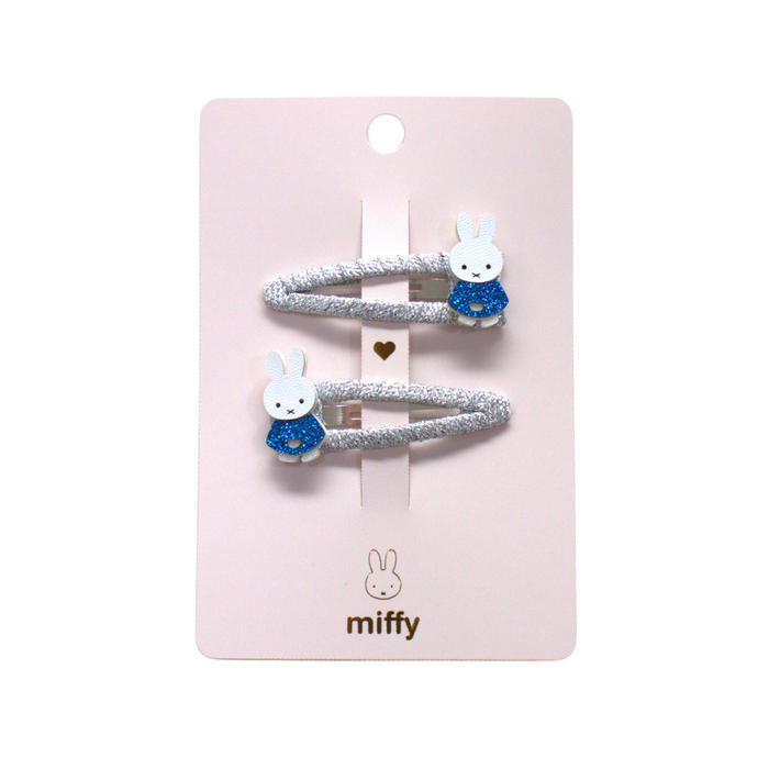 Set of two hair ties with bunny designs on a pink card, featuring the brand 'miffy'.
