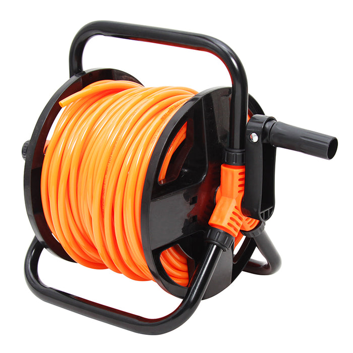 Orange garden hose on a black reel with a nozzle on a white background