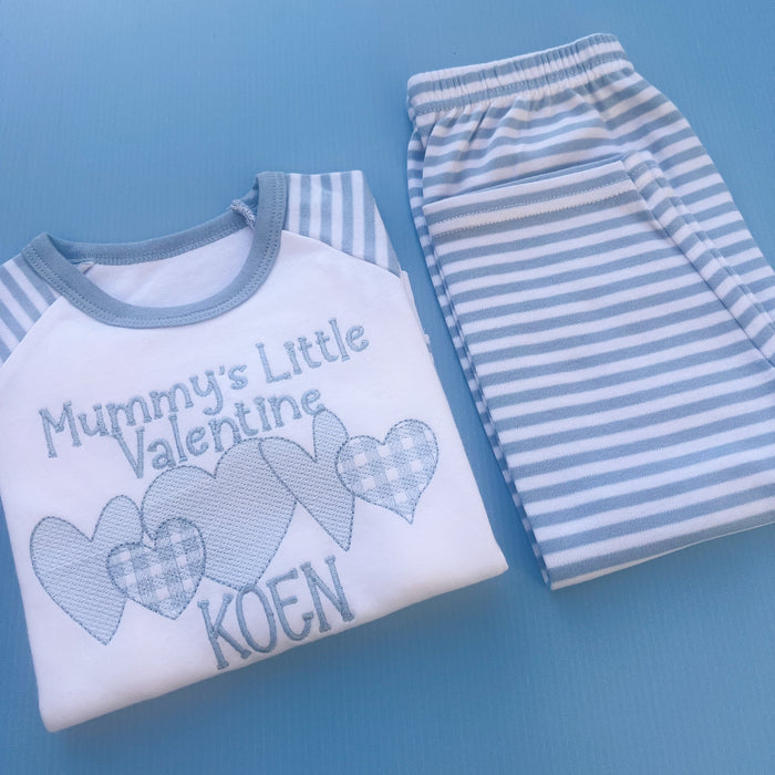 Mummy’s little valentines embroidered into blue stripe pyjamas with a 5 heart design underneath