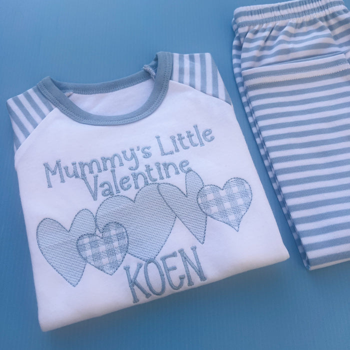 Mummy’s little valentines embroidered into blue stripe pyjamas with a 5 heart design underneath