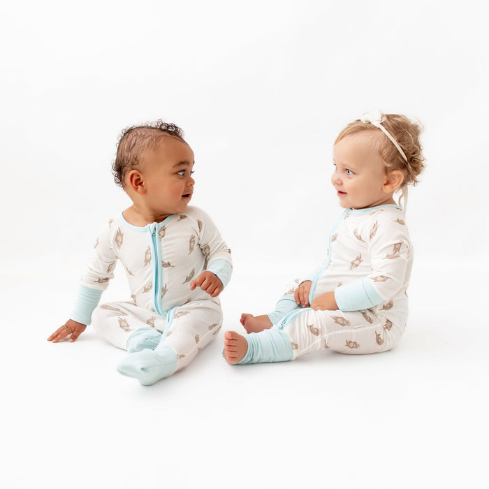 Bamboo baby romper with otter pattern and fold-over mitts