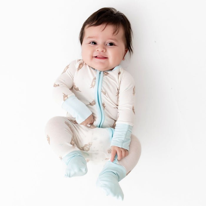 Baby wearing otter bamboo convertible romper