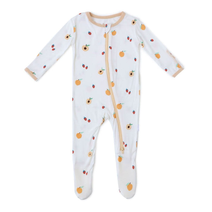 Soft peach bamboo footie pajama flat lay
