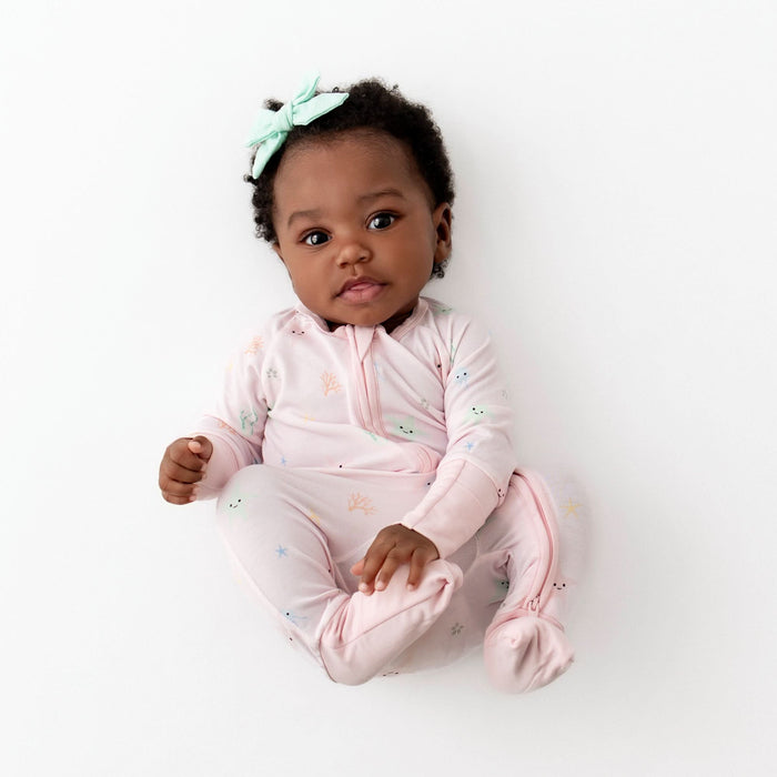 Fold-over hand mitts on starfish bamboo romper