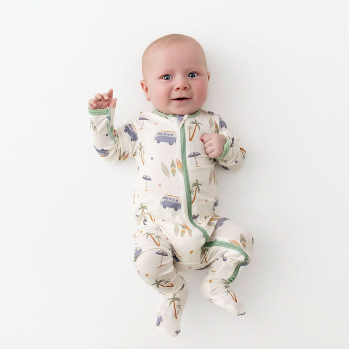 Baby wearing surfboard print bamboo zippered footie pajama
