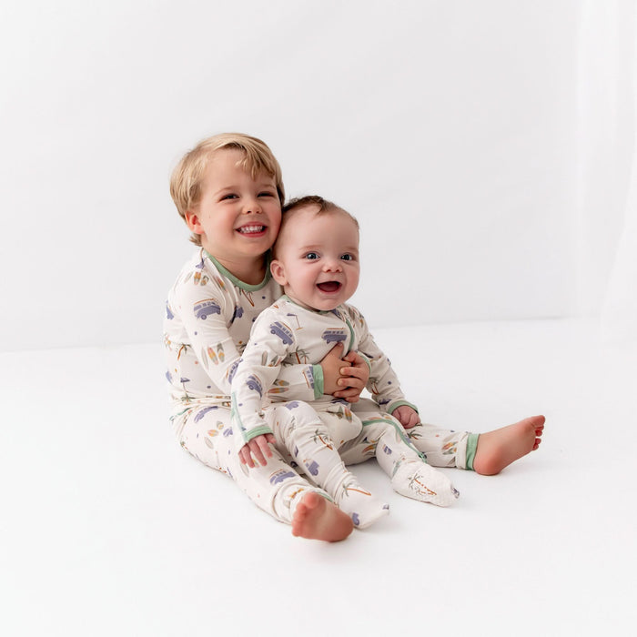 Baby wearing surfboard print bamboo zippered footie pajama