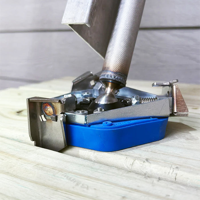 Tread Savage Pro-Level Max Traction with blue base on a wooden surface