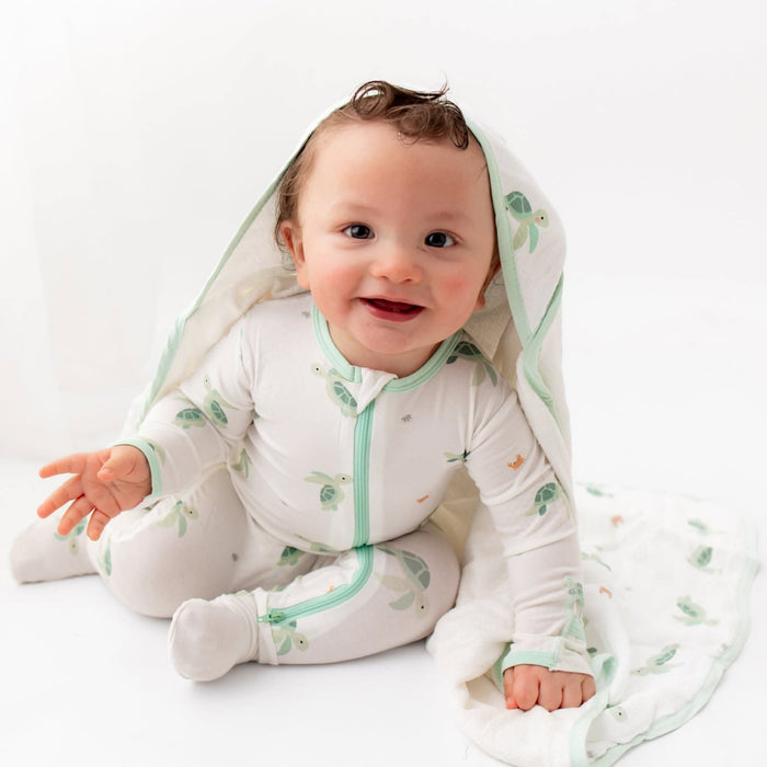 Turtle bamboo baby pajama footie, back view