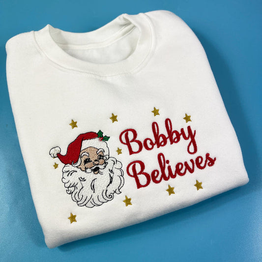 White sweatshirt with vintage Santa