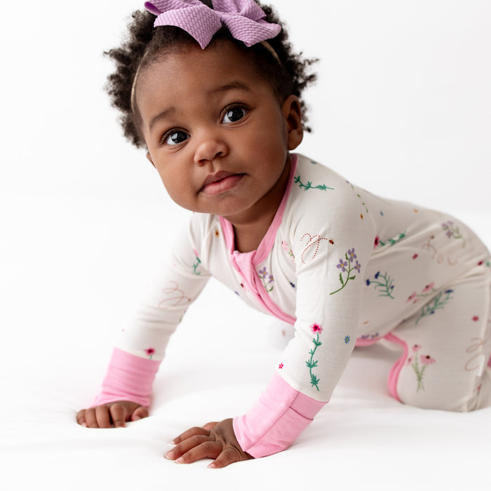Baby wearing wildflowers convertible romper, lifestyle photo