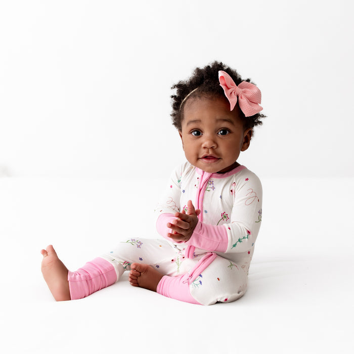 Wildflowers baby romper back view with snap detail